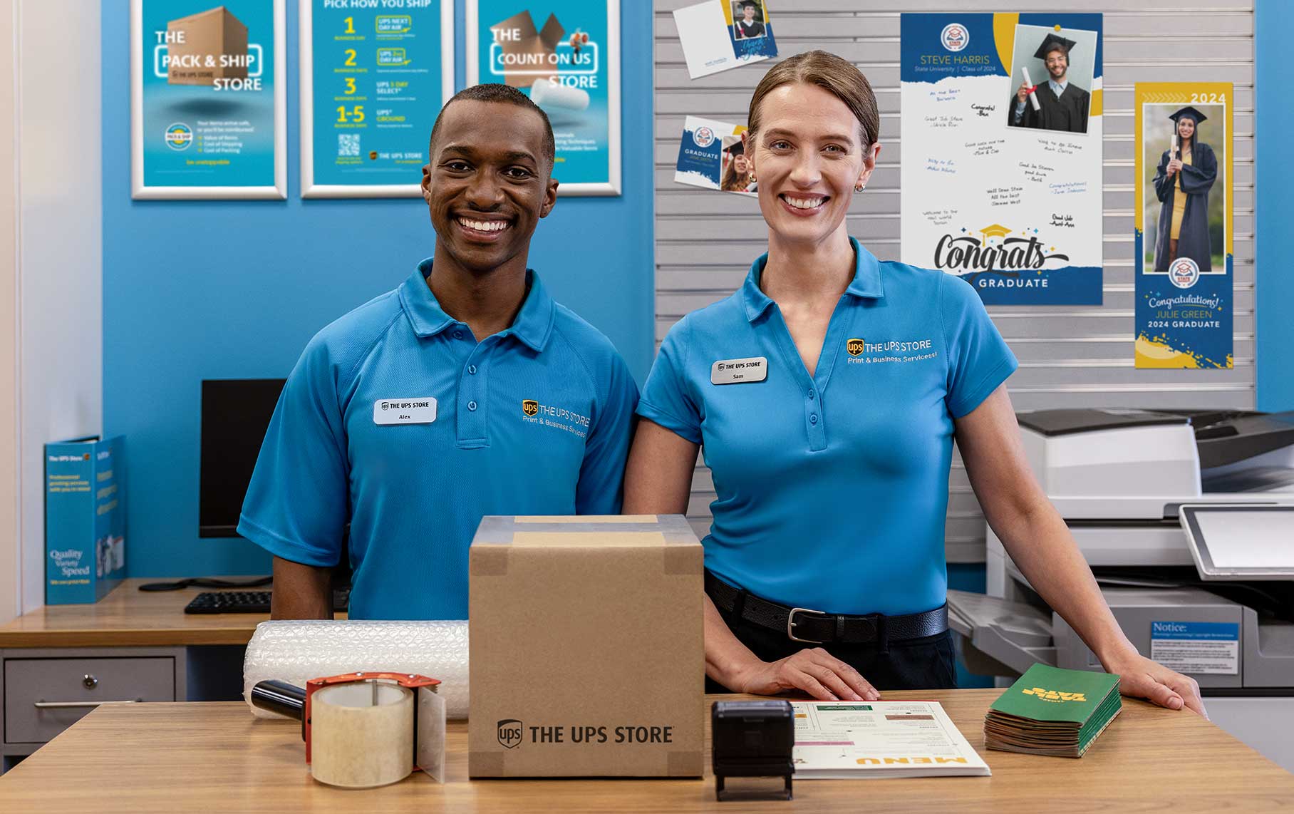 The UPS Store employees providing full service packaging solutions